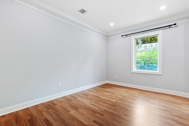 257 Central Ave Unit 1D, White Plains, NY 10606 - unfurnished room featuring crown molding and light wood-style floors