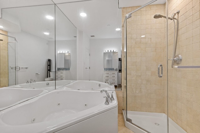 257 Central Ave Unit 1D, White Plains, NY 10606 - full bath featuring a shower stall, a jetted tub, and vanity