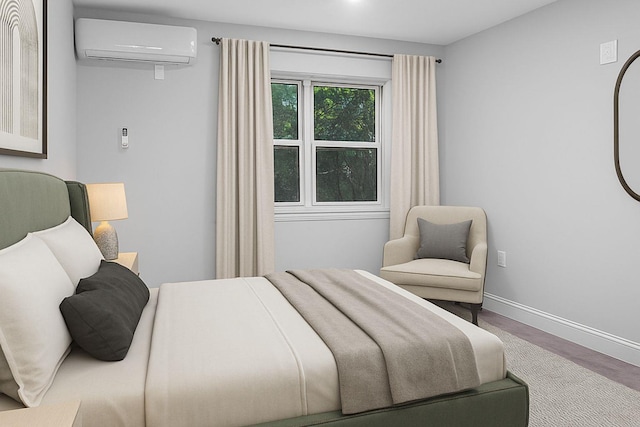 3604 Willett Ave, Bronx, NY 10467 - bedroom featuring a wall mounted AC and wood finished floors