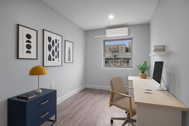 3604 Willett Ave, Bronx, NY 10467 - home office featuring an AC wall unit, wood finished floors, and recessed lighting