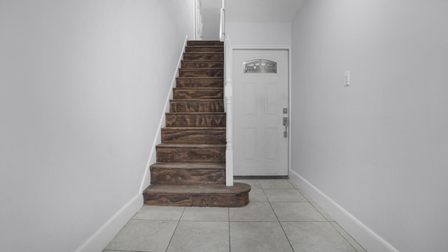 3604 Willett Ave, Bronx, NY 10467 - staircase featuring baseboards and tile patterned floors