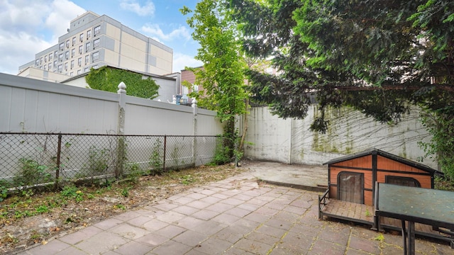3604 Willett Ave, Bronx, NY 10467 - fenced backyard with a patio