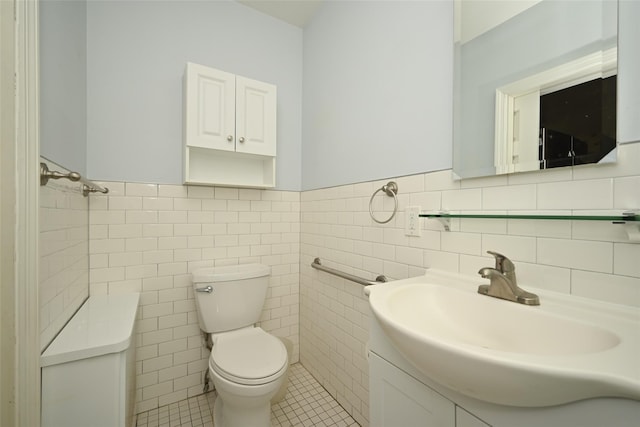 43-44 168th St, Flushing, NY 11358 - bathroom featuring vanity, tile walls, tile patterned floors, and wainscoting