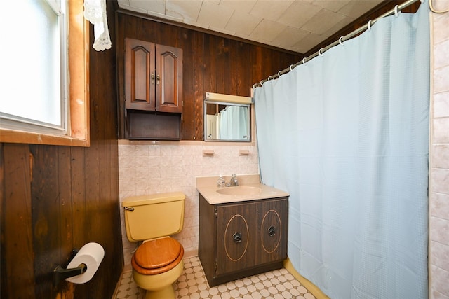 43-44 168th St, Flushing, NY 11358 - bathroom with wood walls, vanity, and a shower with curtain