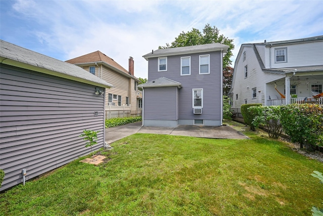 43-44 168th St, Flushing, NY 11358 - rear view of property featuring a patio