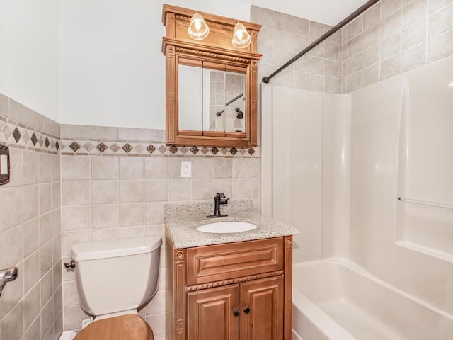 17 Shenorock Dr, Yorktown Heights, NY 10598 - bathroom featuring tile walls, vanity, and tub / shower combination