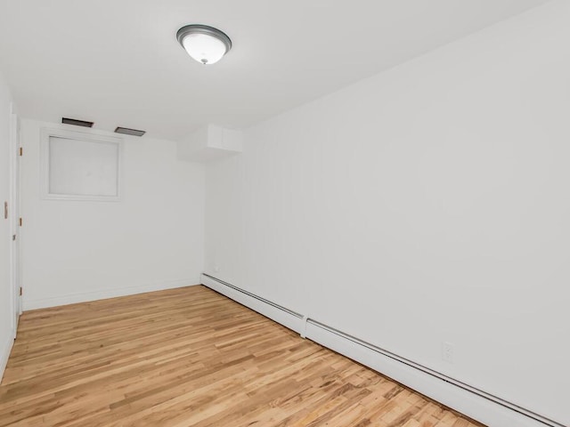 17 Shenorock Dr, Yorktown Heights, NY 10598 - spare room with baseboard heating and light wood-type flooring