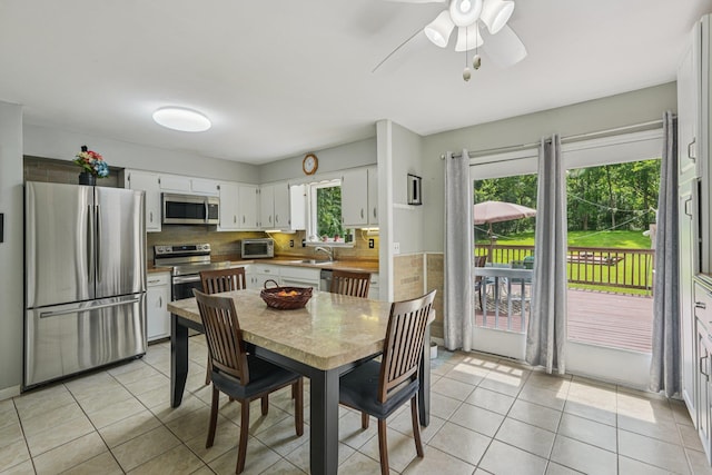 24 Wild Turkey Run, Wappingers Falls, NY 12590 - dining space featuring light tile patterned floors and ceiling fan
