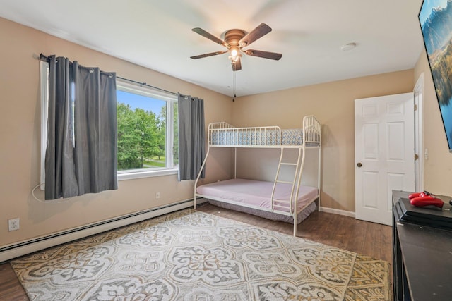 24 Wild Turkey Run, Wappingers Falls, NY 12590 - bedroom featuring wood finished floors, a baseboard radiator, and a ceiling fan