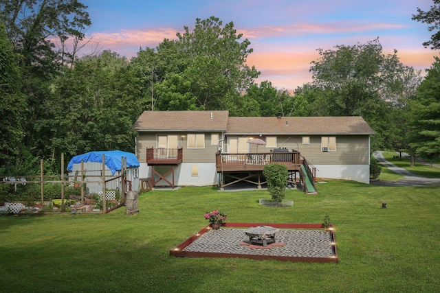 24 Wild Turkey Run, Wappingers Falls, NY 12590 - rear view of property with a deck, an outdoor fire pit, a lawn, and stairs