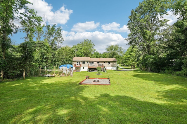 24 Wild Turkey Run, Wappingers Falls, NY 12590 - view of green lawn featuring a deck