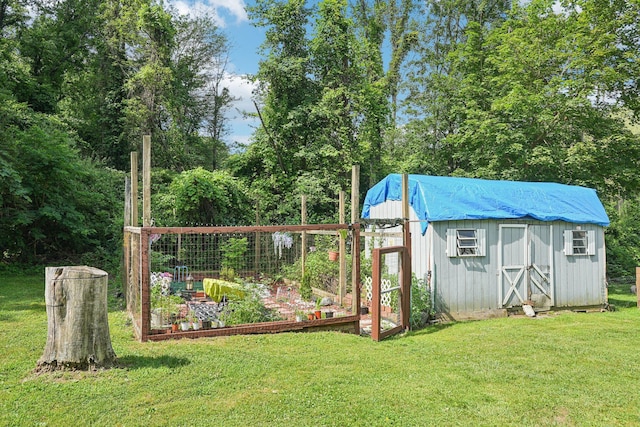 24 Wild Turkey Run, Wappingers Falls, NY 12590 - view of grassy yard with a garden, a storage unit, cooling unit, and a wall mounted air conditioner