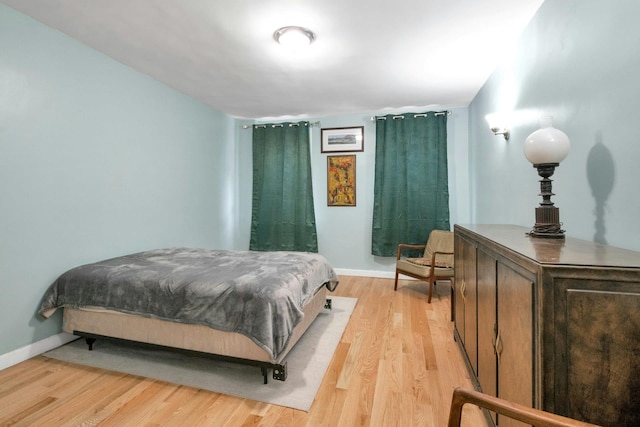 2962 Decatur Ave Unit 1C, Bronx, NY 10458 - bedroom featuring light wood-style flooring and baseboards