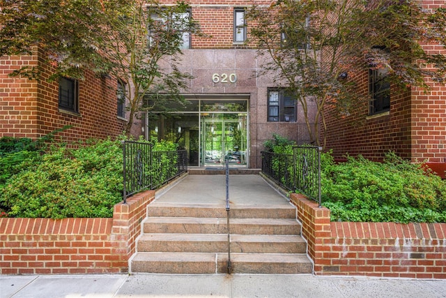 620 W 239th St Unit 2C, Bronx, NY 10463 - property entrance featuring brick siding