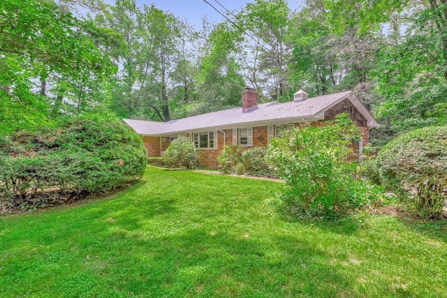 15 Carol Ct, Dix Hills, NY 11746 - single story home with a chimney, a front lawn, and brick siding
