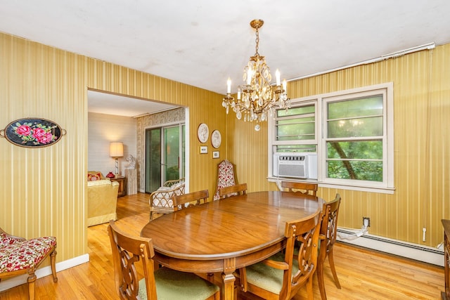 15 Carol Ct, Dix Hills, NY 11746 - dining area featuring a baseboard radiator, light wood-style flooring, cooling unit, and a chandelier