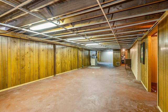 15 Carol Ct, Dix Hills, NY 11746 - unfinished basement with wood walls and washer / clothes dryer