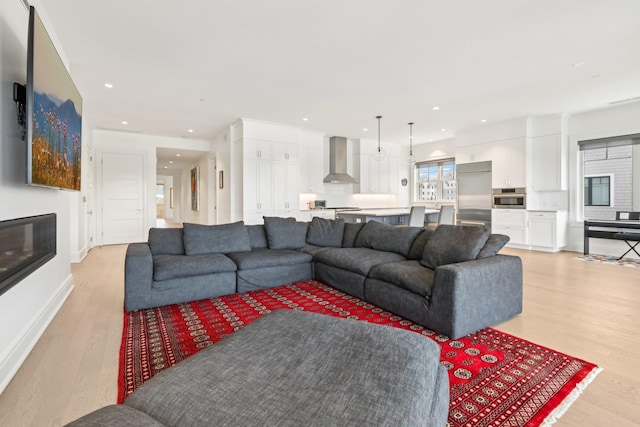 720 Davenport Ave Unit 3, New Rochelle, NY 10805 - living area featuring light wood-style flooring and recessed lighting