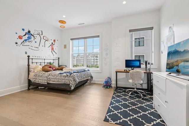 720 Davenport Ave Unit 3, New Rochelle, NY 10805 - bedroom with a desk, wood finished floors, and recessed lighting