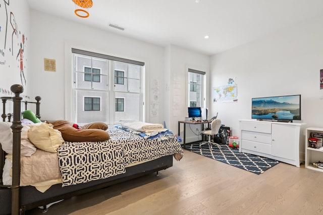 720 Davenport Ave Unit 3, New Rochelle, NY 10805 - bedroom with wood finished floors, recessed lighting, and an office area