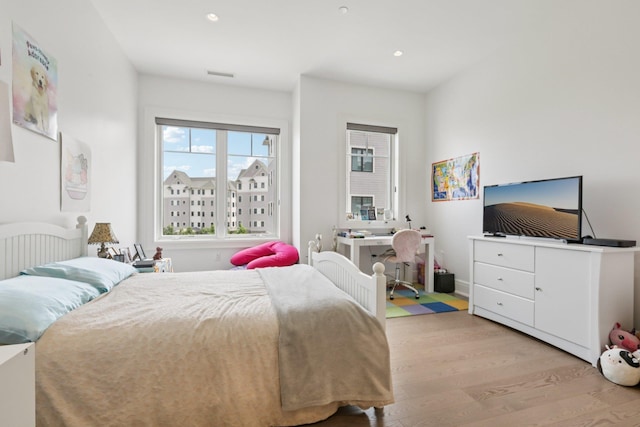 720 Davenport Ave Unit 3, New Rochelle, NY 10805 - bedroom with light wood finished floors and recessed lighting