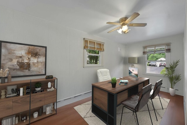 23 Jackson Ave, White Plains, NY 10606 - office with wood finished floors, a baseboard radiator, and a ceiling fan