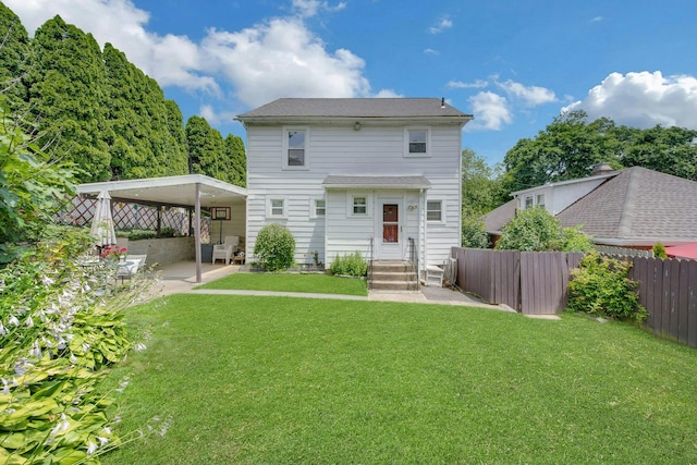 23 Jackson Ave, White Plains, NY 10606 - rear view of property with entry steps, a carport, and a patio area