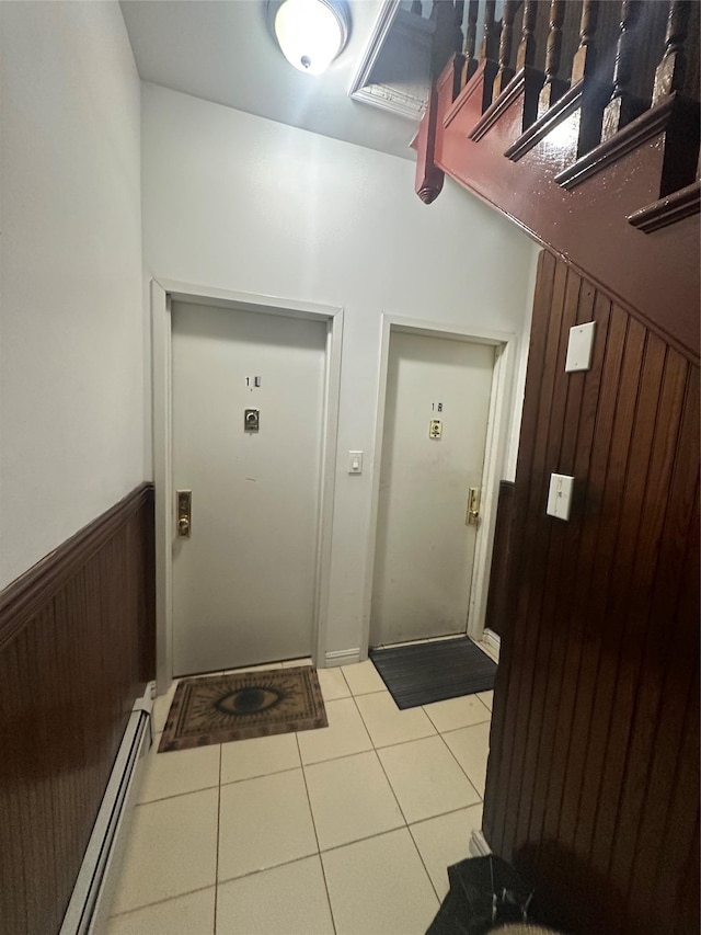 31-67 44th St, Astoria, NY 11103 - entrance to property featuring a baseboard heating unit