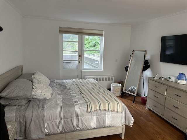 1133 Midland Ave Unit 1K, Yonkers, NY 10708 - bedroom featuring radiator, ornamental molding, dark wood finished floors, and french doors