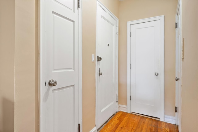 30 Clinton Pl Unit 2F, New Rochelle, NY 10801 - doorway with light wood finished floors and baseboards