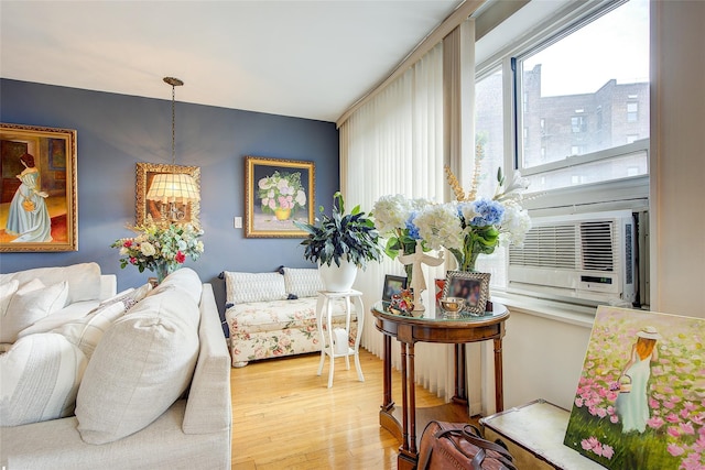 210-15 NW 23rd Ave Unit 3C, Bayside, NY 11360 - living area with light wood-style floors and cooling unit