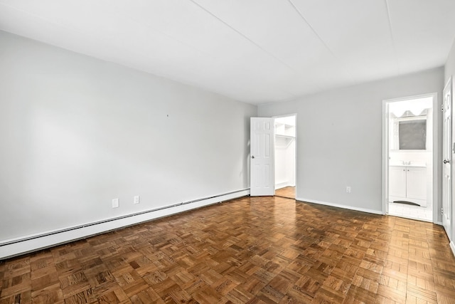 370 Central Park Ave Unit 3D, Scarsdale, NY 10583 - spare room with a baseboard radiator and baseboards
