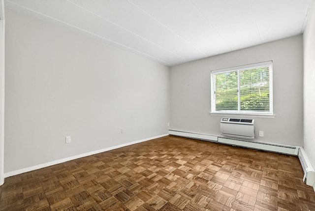 370 Central Park Ave Unit 3D, Scarsdale, NY 10583 - empty room with an AC wall unit and baseboard heating
