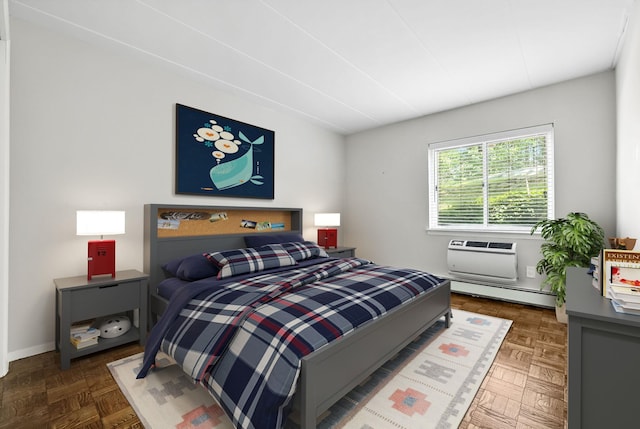 370 Central Park Ave Unit 3D, Scarsdale, NY 10583 - bedroom with a baseboard heating unit and a wall unit AC