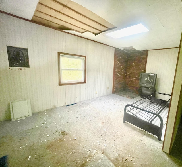 94 Sickle Rd, Wurtsboro, NY 12790 - unfurnished bedroom featuring a wood stove