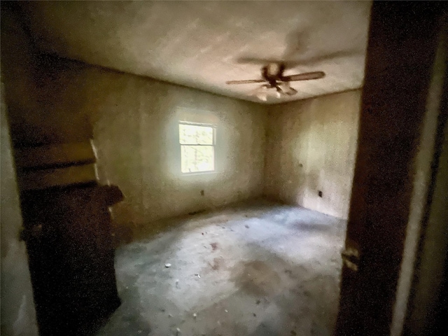 94 Sickle Rd, Wurtsboro, NY 12790 - unfurnished room with a ceiling fan and unfinished concrete floors