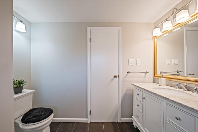 19 Buttercup Ln, Levittown, NY 11756 - bathroom with wood finished floors and vanity
