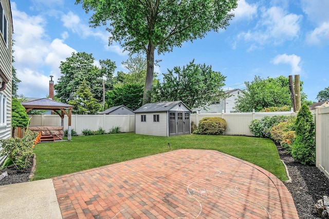 19 Buttercup Ln, Levittown, NY 11756 - fenced backyard with a gazebo, a patio area, and an outdoor structure