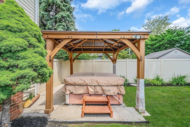19 Buttercup Ln, Levittown, NY 11756 - view of patio featuring a hot tub, a gazebo, and a grill