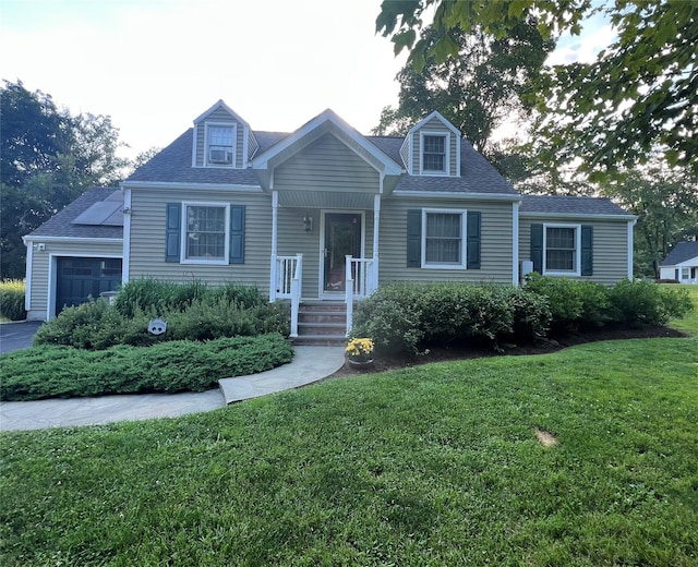 7 Croft Rd, Poughkeepsie, NY 12603 - cape cod-style house featuring a front lawn, an attached garage, and a shingled roof
