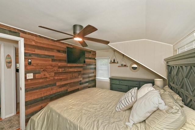15 5th Ave, Kings Park, NY 11754 - bedroom with wood walls, ceiling fan, and vaulted ceiling