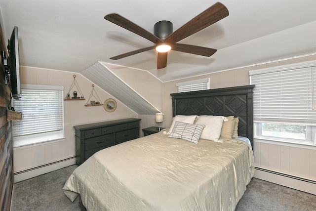 15 5th Ave, Kings Park, NY 11754 - carpeted bedroom featuring baseboard heating, ceiling fan, and wooden walls