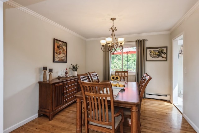 9 Phyllis Ct, Kings Park, NY 11754 - dining space featuring baseboard heating, a chandelier, light wood-type flooring, and crown molding