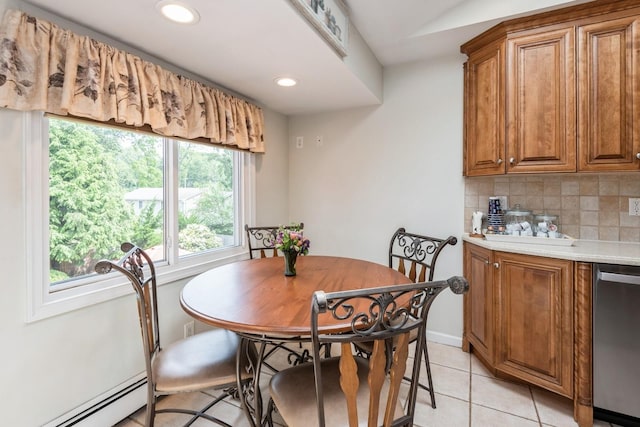9 Phyllis Ct, Kings Park, NY 11754 - dining area with a baseboard heating unit, recessed lighting, and light tile patterned floors