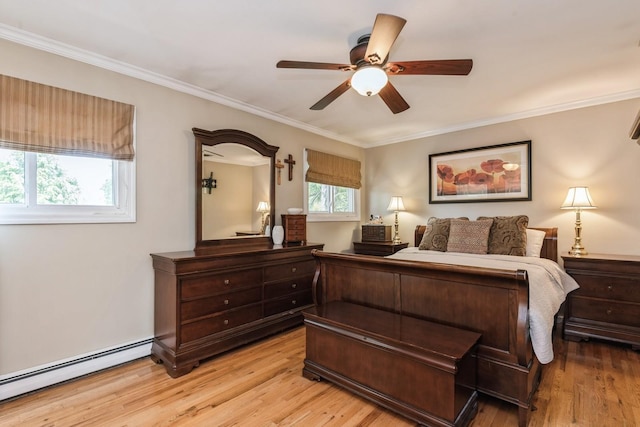 9 Phyllis Ct, Kings Park, NY 11754 - bedroom featuring a baseboard heating unit, light wood-style floors, ornamental molding, and a ceiling fan