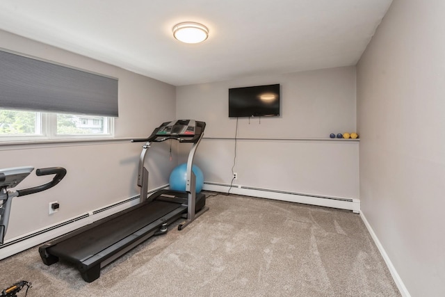 9 Phyllis Ct, Kings Park, NY 11754 - exercise room featuring a baseboard heating unit and carpet