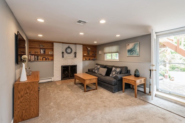 9 Phyllis Ct, Kings Park, NY 11754 - carpeted living area with a baseboard heating unit, recessed lighting, and a fireplace