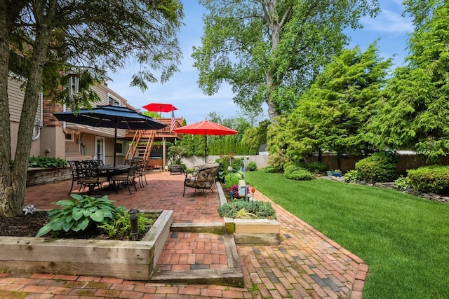 9 Phyllis Ct, Kings Park, NY 11754 - fenced backyard featuring a patio, outdoor dining area, and a gazebo