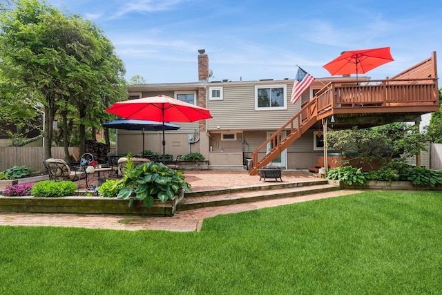 9 Phyllis Ct, Kings Park, NY 11754 - back of property featuring a patio, stairway, a wooden deck, and a chimney