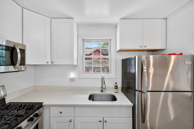 12 Lake Region Blvd, Monroe, NY 10950 - kitchen featuring stainless steel appliances, white cabinets, and light countertops